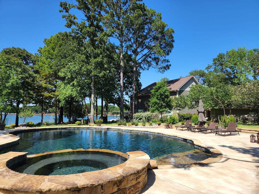 Stamped concrete patio with decorative pattern and color