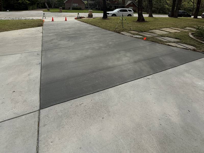 Broom finish concrete driveway installed by Concrete Canvas